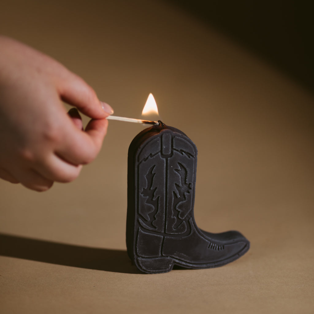 gold and ivy black midnight cowboy boot soy shape candle